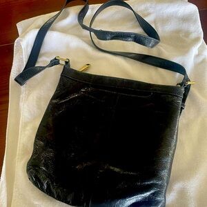 Black soft HOBO crossbody measures 9 *9 inches Perfect for essentials!
